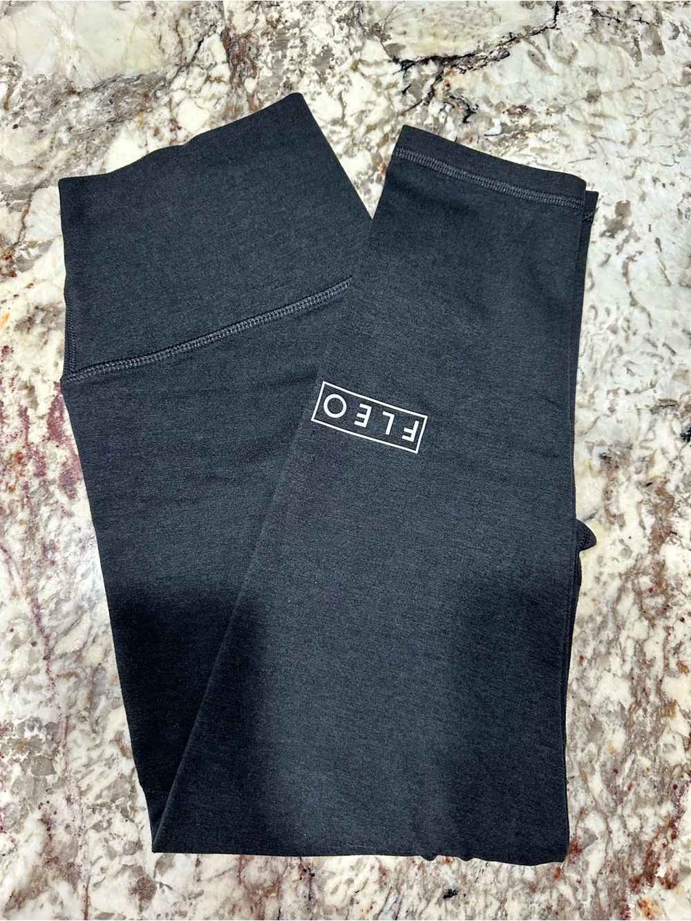 FLEO El Toro leggings size medium 21” inseam high rise- Heather black color